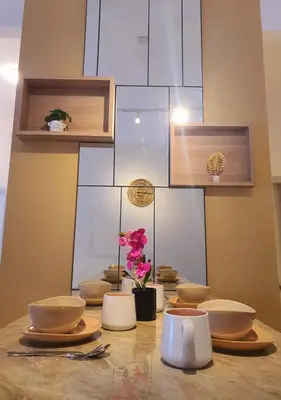 a table with plates and bowls on top of it at Mocha Suite @ The Horizon Ipoh [4 to 6 pax] in Ipoh