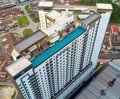 an aerial view of a large building with a swimming pool at Mocha Suite @ The Horizon Ipoh [4 to 6 pax] in Ipoh
