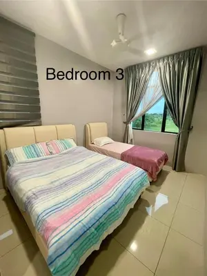 a bedroom with two beds and a window at LOW SEASON PROMOTION! 4B12B Bar 5 min City Center in Ipoh