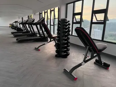 a row of chairs in a gym with windows at The Horizon - Ipoh in Ipoh