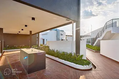a balcony of a building with a sink and stairs at Ipoh City Executive Suite - The Horizon in Ipoh