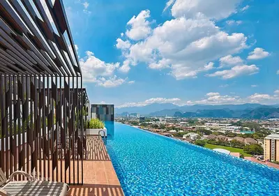 a swimming pool on the side of a building at Ipoh City Executive Suite - The Horizon in Ipoh