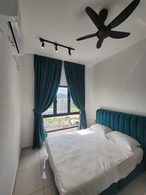 a bedroom with a bed with a fan and a window at Horizon Premium Suite - Ipoh in Ipoh