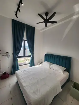 a bedroom with a bed with a ceiling fan and a window at Horizon Premium Suite - Ipoh in Ipoh