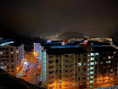 a view of a city at night with buildings at Adik Aisyah classic 2 in Cameron Highlands