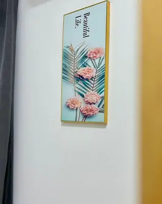 a picture of pink flowers on a wall at Ipoh Cozy Homestay by Comfort Home in Ipoh