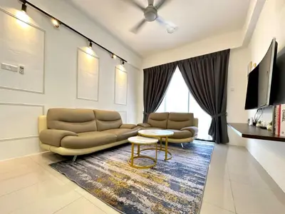 a living room with a couch and a table at Ipoh Cozy Homestay by Comfort Home in Ipoh
