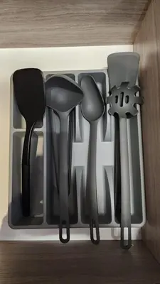 a group of utensils in a drawer at Urbanite Premier Suite - Horizon Ipoh by Grab A Stay in Ipoh