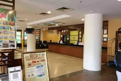 a waiting area of a fast food restaurant at Coral Bay \u5c0f\u578b\u516c\u5bd3 in Pasir Bogak