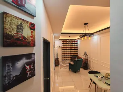 a view of a living room with a dining room at WHITE ON HOMESTAY CAMERON BY ICOLOR in Tanah Rata