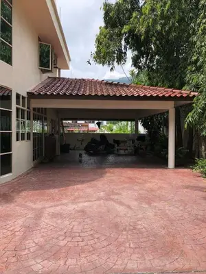 a large pavilion in the middle of a house at Supreme Homestay in George Town