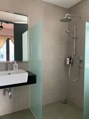 a bathroom with a sink and a shower at Comfy Stay x 218 Macalister 2BR (Georgetown) \u4e54\u6cbb\u5e02\u4e2d\u5fc3 in George Town