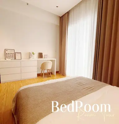 a bedroom with a bed and a desk and a window at The Beacon Executive Penang Georgetown in George Town