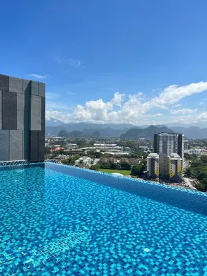 a swimming pool with a view of a city at The Horizon Ipoh By Iconique Espace in Ipoh