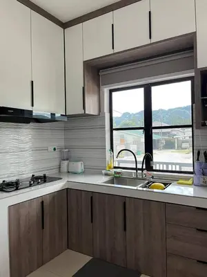 a kitchen with a sink and a window at Tambun Hillview Cottage 2 in Ipoh
