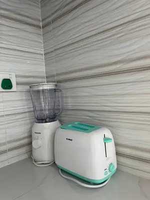 a toaster and a blender sitting on a counter at Tambun Hillview Cottage 2 in Ipoh