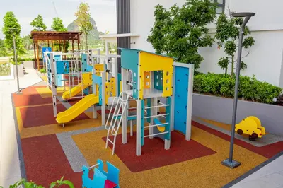 a playground with colorful equipment on a carpet at Ipoh Tambun Lost World Sunway Onsen Mina 3R2B 8pax in Tambun