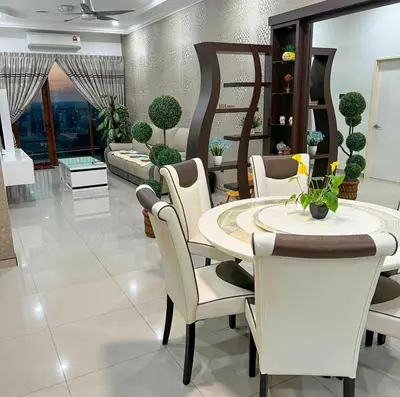 a dining room with a table and chairs at Taiping City View 3BR Condo near Lake Garden with Sunset View & Swimming Pool, Free Netflix WiFi in Taiping