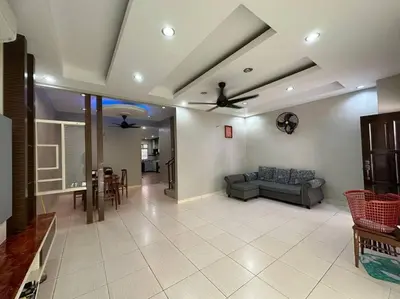 a living room with a couch and a ceiling fan at Muslim Suite Home @ Airport Bayan Lepas Penang in Bayan Lepas
