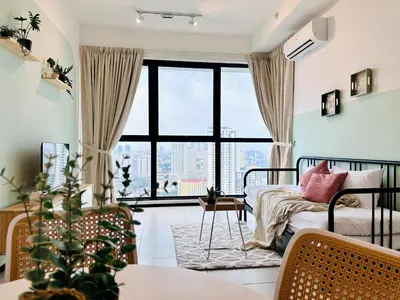 a bedroom with a bed and a large window at Urban Suite Cozy Family Homestay at Georgetown by URBAN STAYCATION HENG LOD LUXE in Jelutong