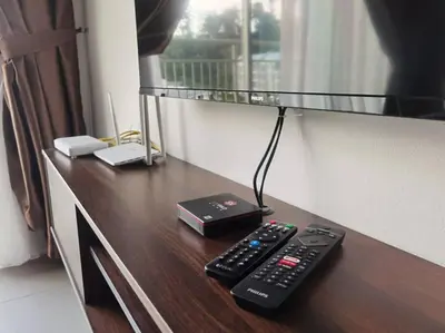 a remote control sitting on top of a desk at G Residence - 2R2B Barrington Night Market (2) in Brinchang