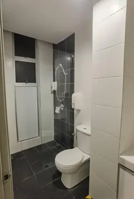 a bathroom with a toilet and a shower at G Residence - 2R2B Barrington Night Market (2) in Brinchang