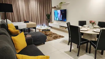 a living room with a table and a dining room at SkyPool 2BR 9pax Premium Suite@Beacon @Georgetown @Penang in George Town