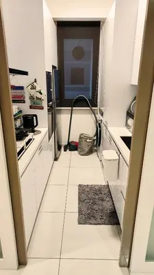 a kitchen with a refrigerator and a tile floor at SkyPool 2BR 9pax Premium Suite@Beacon @Georgetown @Penang in George Town