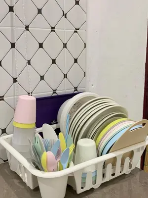 a white tray filled with dishes and other dishes at Rezeki indah Hstay self check in in Bukit Mertajam
