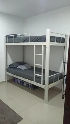 a couple of bunk beds in a room at TokBi Homestay Gerik in Gerik