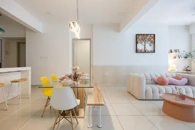 a living room with a couch and a table at The Jazz Serviced Suites in Tanjong Tokong