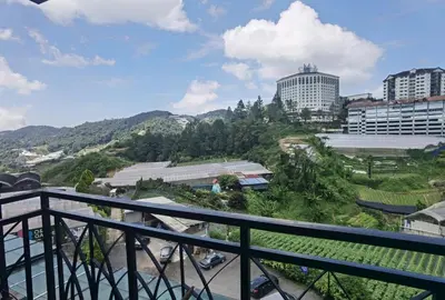 a view of a city from a balcony at Cameron Square, Nova Highlands - 1BR Studio Suite in Brinchang