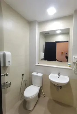 a bathroom with a toilet and a sink at Cameron Square, Nova Highlands - 1BR Studio Suite in Brinchang