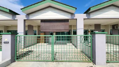 a gate in front of a building at Homestay LK in Sitiawan