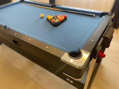 a pool table with cue balls on top of it at Ipoh 19A Villa for 12pax 6 Carpark with BBQ by IWH in Ipoh