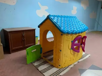 a play room with a toy dog house at Pangkor Island CoralBay Private Apartment in Pasir Bogak