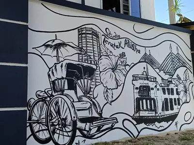 a mural of a rickshaw on the side of a building at Studio Teratak Alisha Permatang Pauh in Permatang Pauh