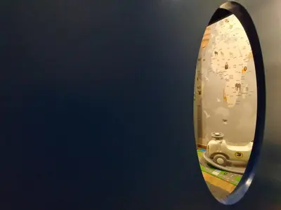 a mirror with a reflection of a camera in it at be.Bliss-8mins Lost World Tambun-6-7pax in Ipoh