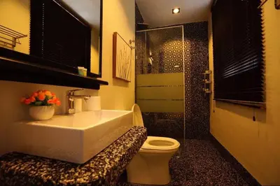 a bathroom with a sink and a toilet at Ipoh Old Town Heritage Family Suite-6R4B -12-16pax in Ipoh