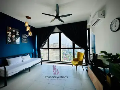a bedroom with a bed and a ceiling fan at New 2BR or 3BR Cozy Urban Suite Homestay at Georgetown8-10pax by URBAN STAYCATIONS LOD COSY in Jelutong