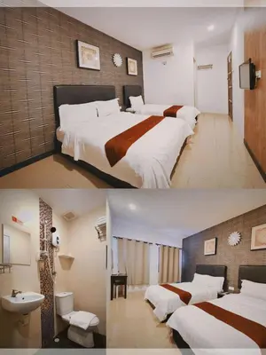 two pictures of a hotel room with two beds at Inn Residence 18 in George Town