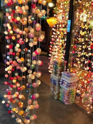 a store with a bunch of different types of umbrellas at New! Batu Ferringhi Seaview Cozy Condo, Penang in Batu Ferringhi