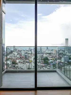 an open window with a view of a city at Beacon Executive Suite by Uptrend Home Management in George Town