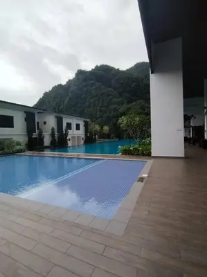 a view of a swimming pool at a resort at Sunway Onsen 4-5pax in Kampong Batu Lapan