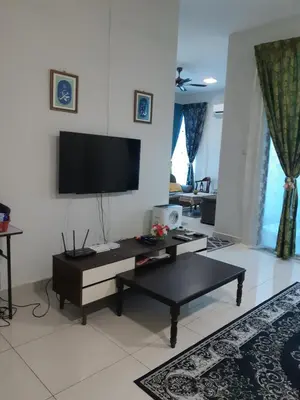 a living room with a flat screen tv on the wall at 132-A, JHC Homestay Puncak in Kampung Bota Kiri