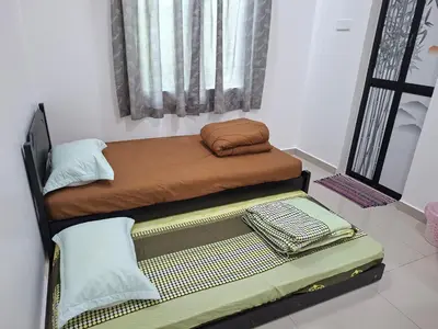 a room with a bunk bed and a window at 132-A, JHC Homestay Puncak in Kampung Bota Kiri