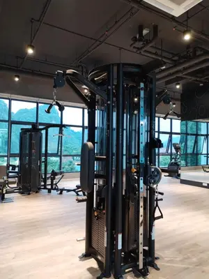 a gym with a bunch of treadmills and machines at Sunway Onsen Suites beautiful view in Kampong Batu Lapan