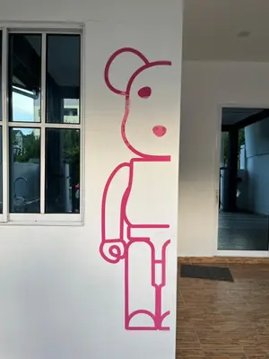 a painting on the side of a building at Big Dreams Double Story House in Tanah Rata