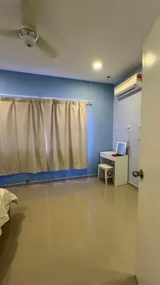 a room with a window and a desk with a laptop at 515 Nana’s Homes in Sekinchan in Sekincan