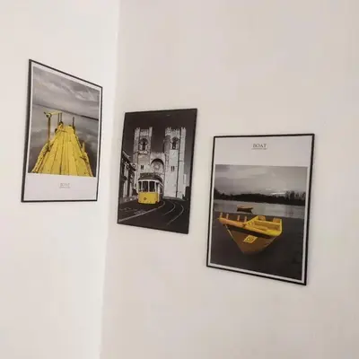 a group of four pictures on a wall at HAPPY GATHER HOMESTAY in Ipoh